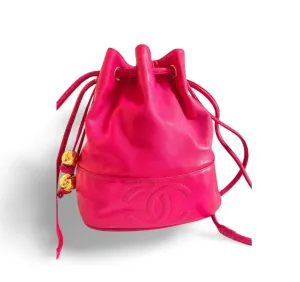 CHANEL Vintage fusia pink lambskin hobo bucket shoulder bag with CC golden balls and CC stitch mark