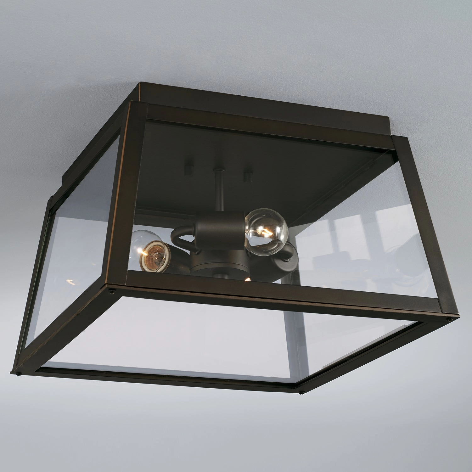 Leighton Three Light Outdoor Flush Mount Oiled Bronze Exterior Ceiling Lights markdown