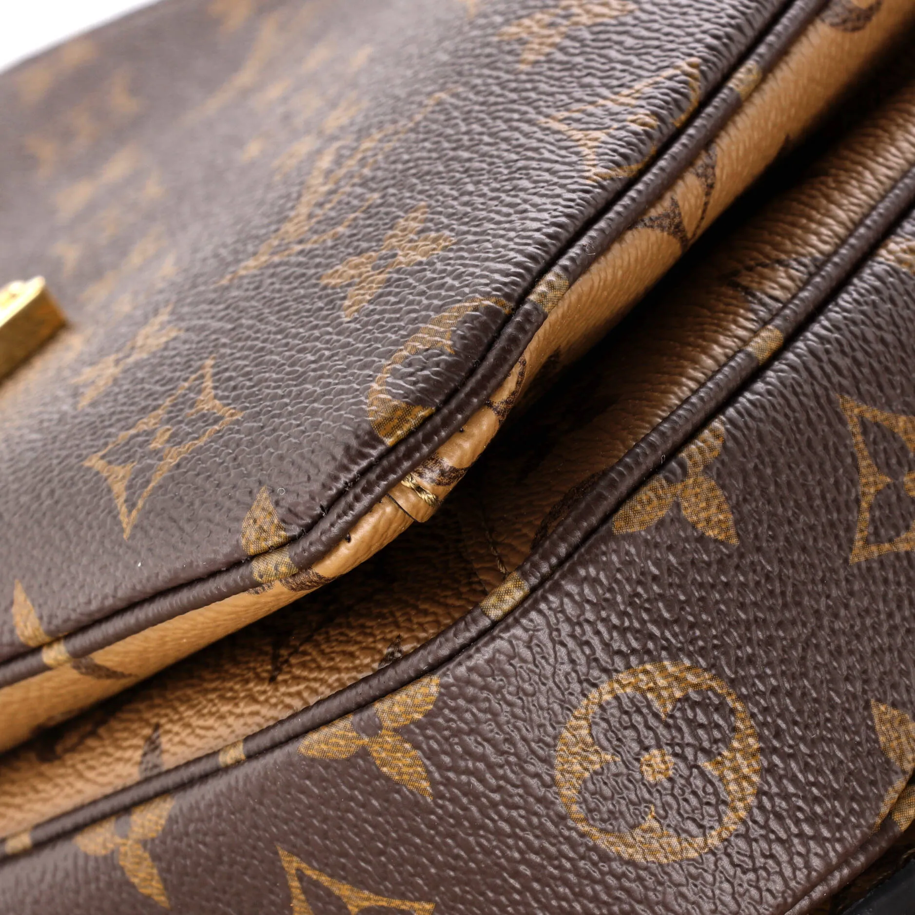 Pochette Metis Reverse Monogram Canvas